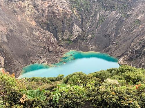 body of water surrounded by mountains