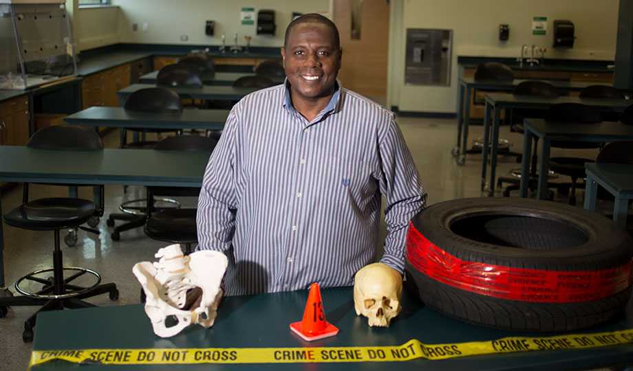 Theo Darden standing in lab
