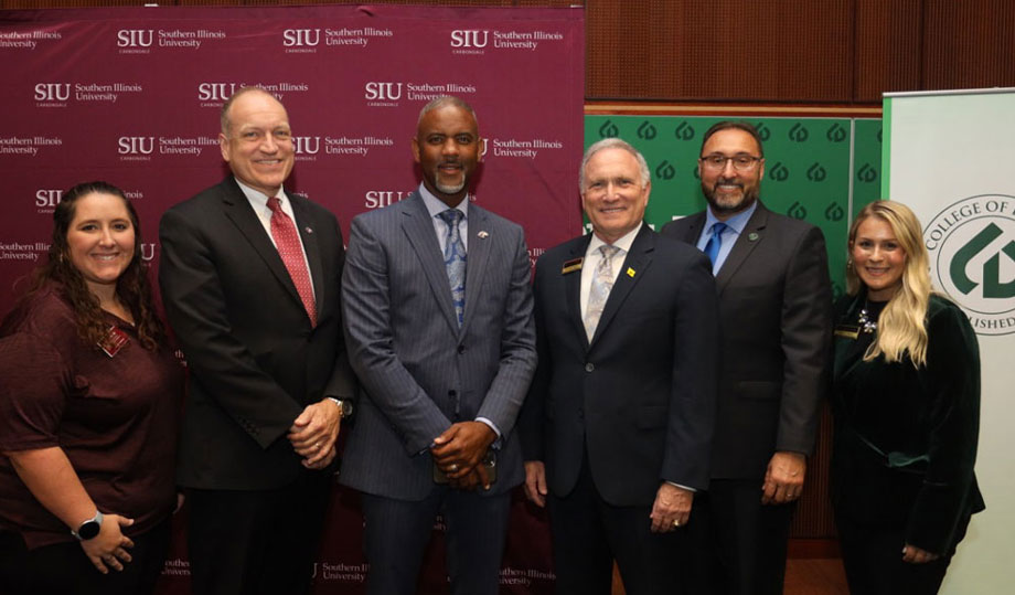 COD President Dr. Brian Caputo and Provost Mark Curtis Chavez at a signing ceremony with SIU Chancellor Ausin Lane