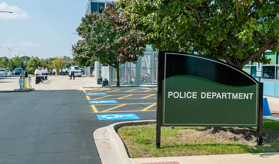 a sign of the police department outside the Homeland Security building