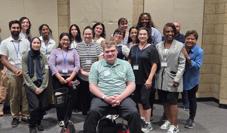 Legal Studies students pose for group photo at event