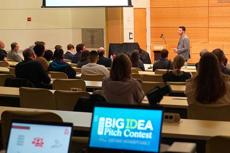 male speaker talking to an audience