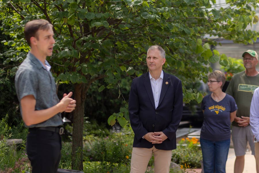 Sean Casten tours the College's sustainable urban farm.