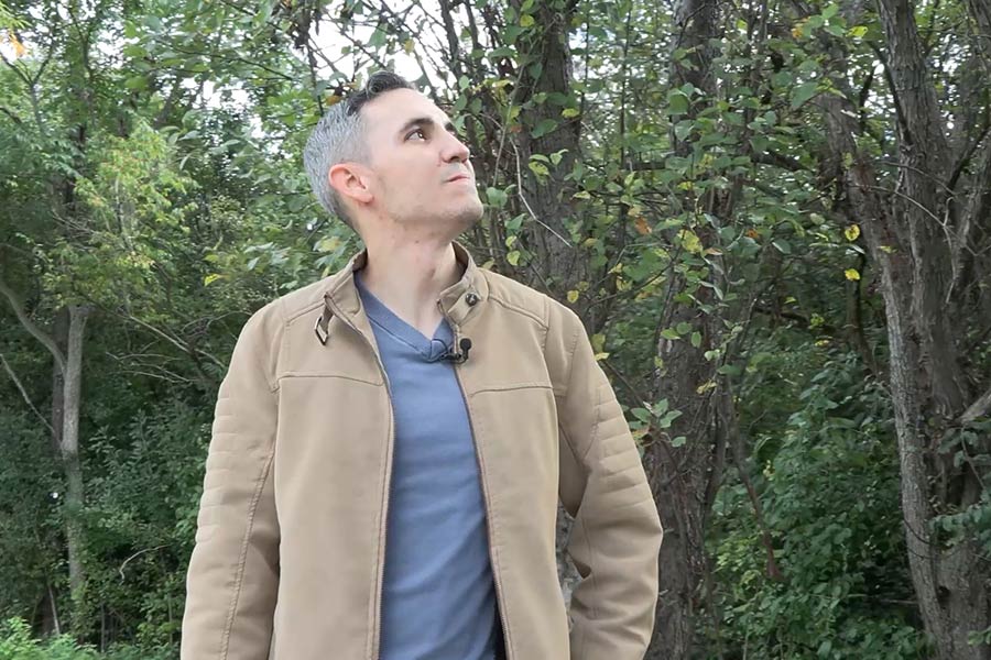 Devin Chambers looking at trees