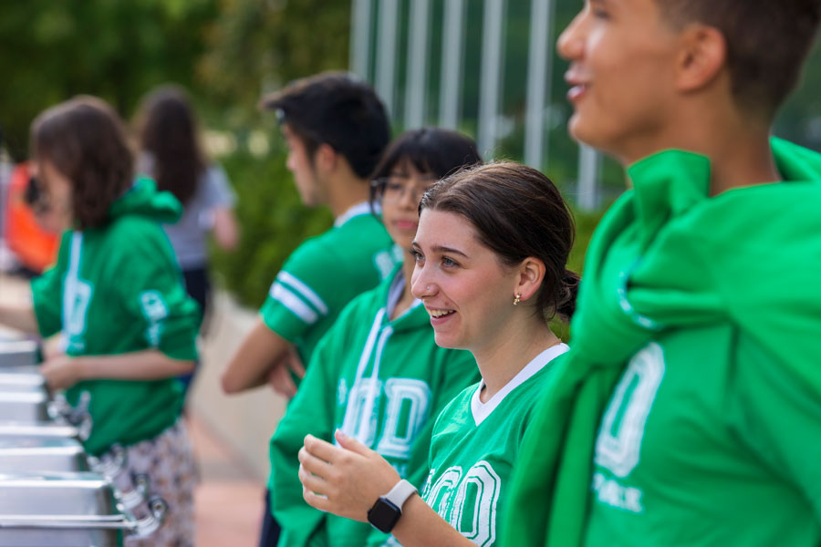 NSO students in a line, smiling